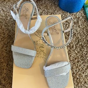 Originally bought for my wedding, Tried on once otherwise never worn.